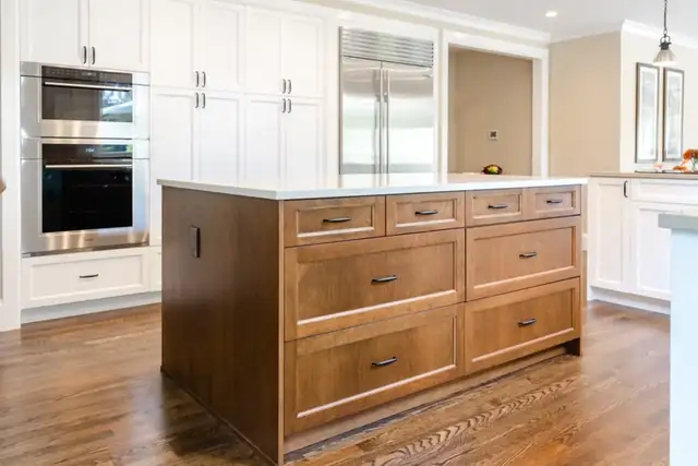 Mill Creek, WA main floor remodel with a stained wood kitchen island and white Shaker pantry cabinets